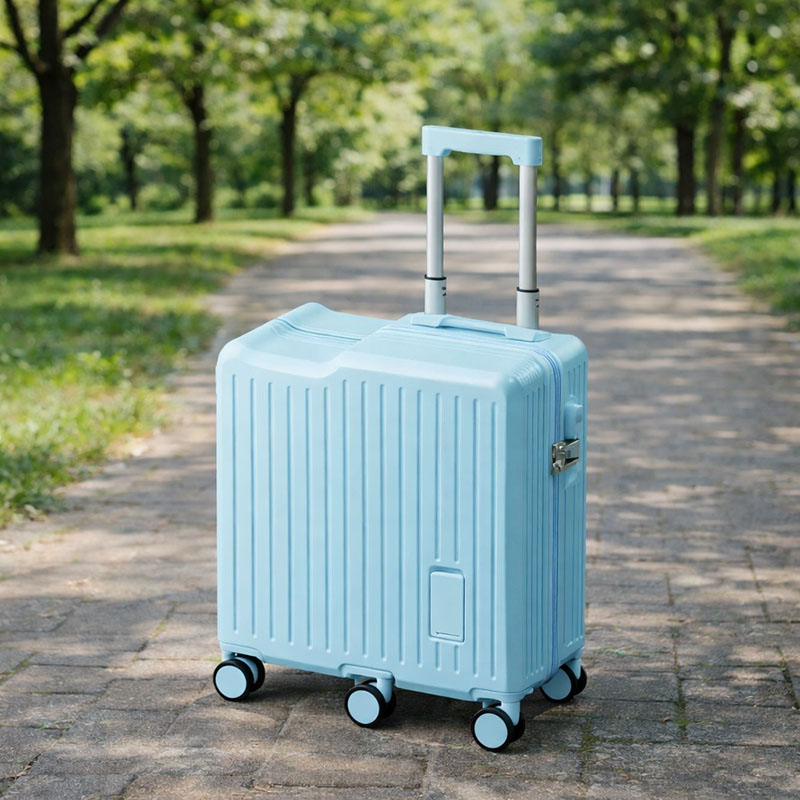 compact spinner luggage in light blue compact spinner luggage in light blue