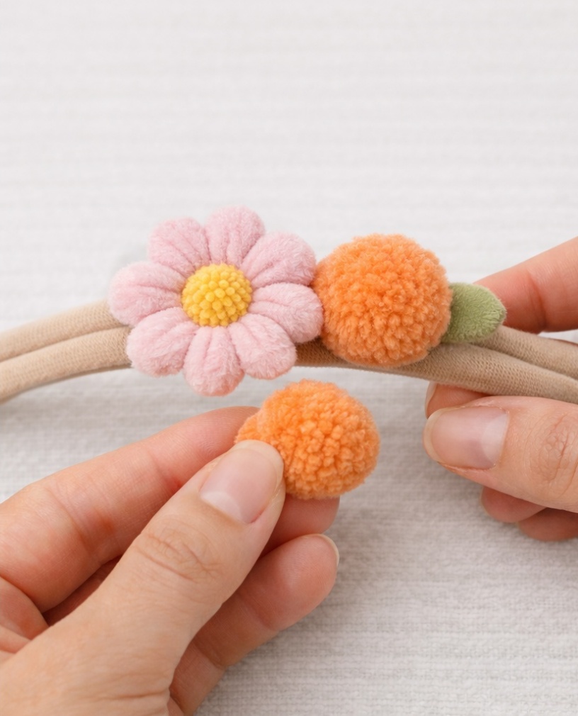 Orange Blossom Baby Headband with Playful Floral Touch