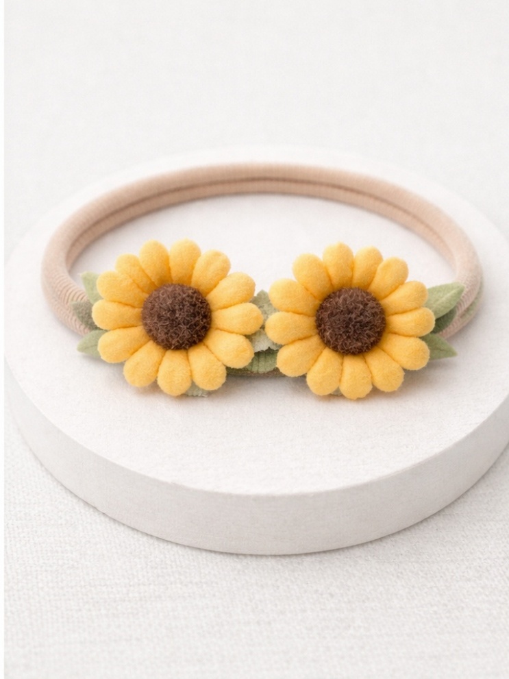 Diadema de girassóis amarelos para bebê