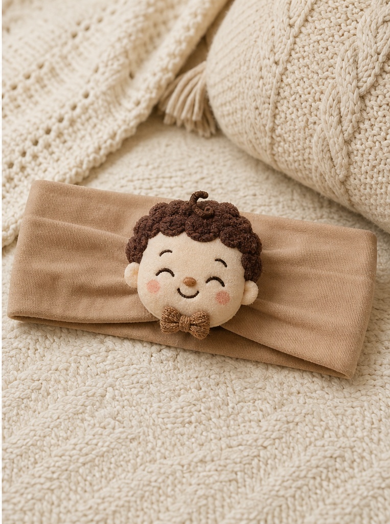 Bandeau bébé en peluche avec poupée garçon amovible – Accessoire doux idéal pour collections boutique et commandes B2B