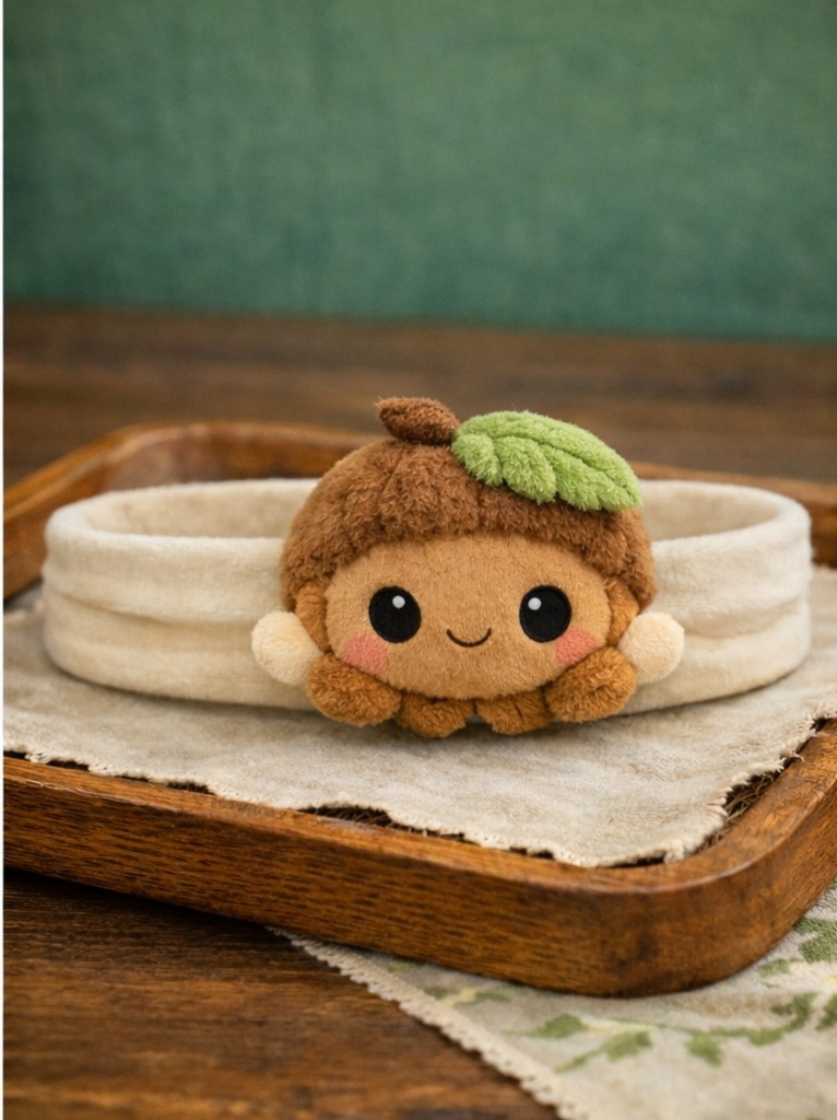 Bandeau bébé peluche gland noisette, pensé pour plaire aux acheteurs B2B