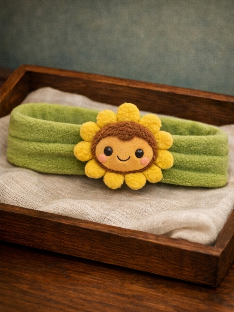 Diadema de bebé con girasol suave, pensada para compradores B2B