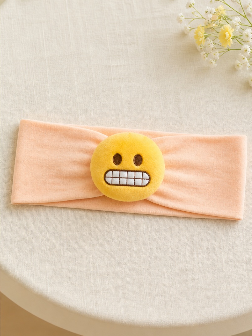 Wholesale Pink Baby Doll Headband with Detachable Grimacing Emoji Plush for Boutique Orders