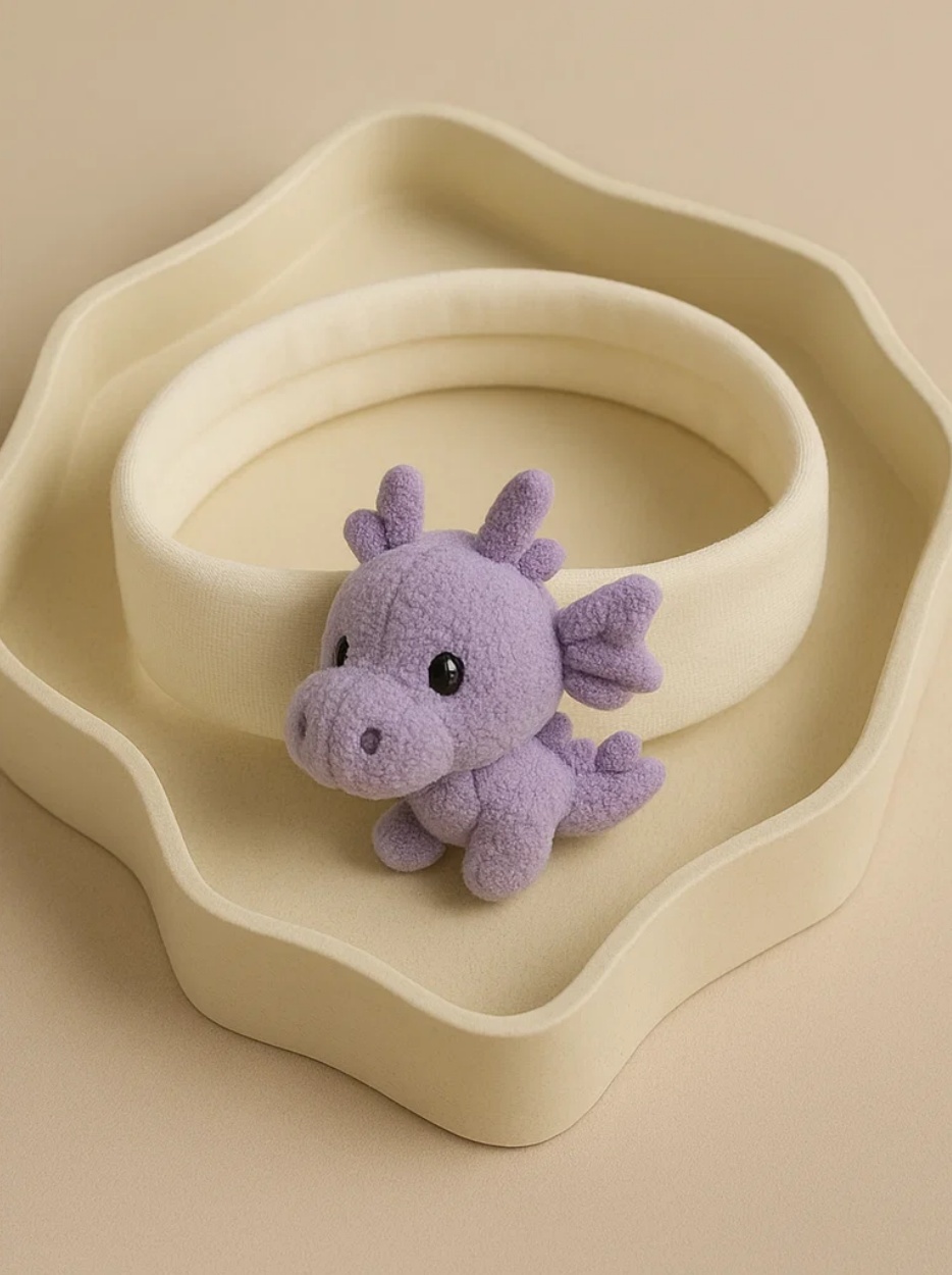 Bandeau bébé avec jouet dinosaure, parfait pour les photos