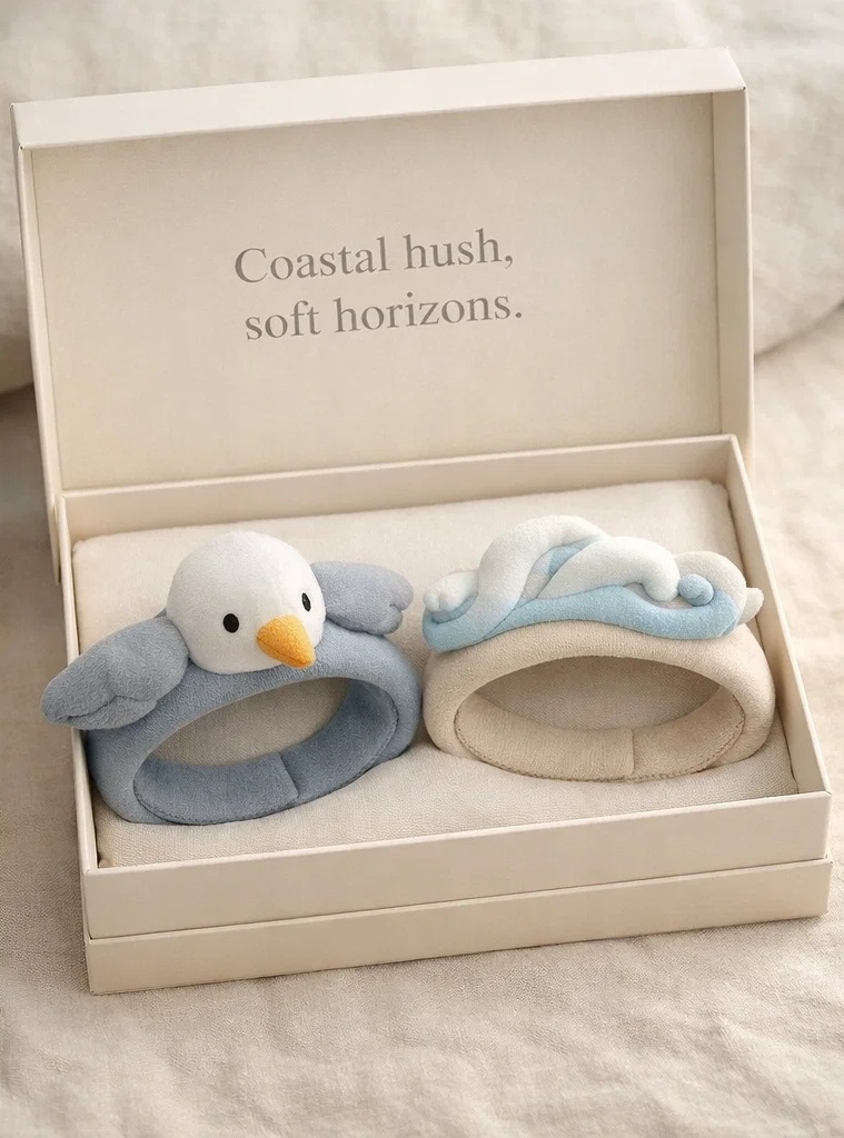 Duo de bandeaux bébé mouette et vagues détachables en peluche pour boutiques bébé, cadeaux naissance et vitrines côtières