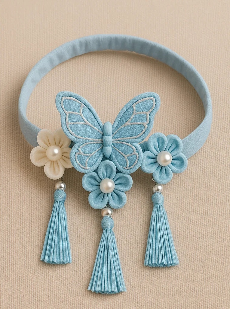 Diadema azul cielo para bebé con mariposa, borlas y bordado floral