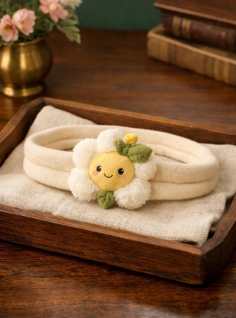 Diadema para bebé con flor blanca de felpa – producto estrella para mayoristas y boutiques infantiles