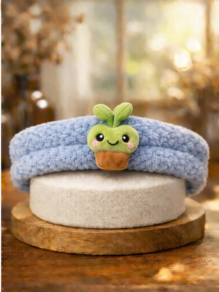 Faixa de cabelo infantil com design vegetal em pelúcia