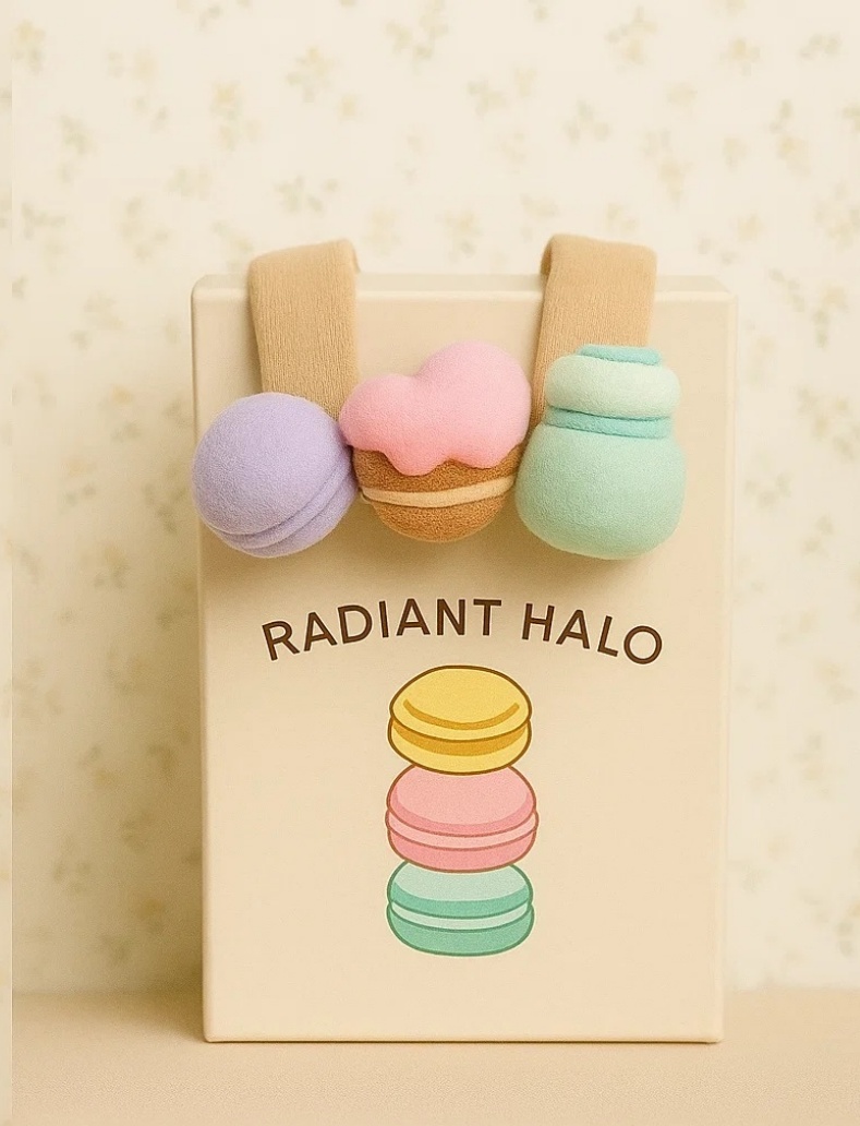 Diadema para bebé Radiant Halo con diseño de macaron, dona y helado (pastel).
