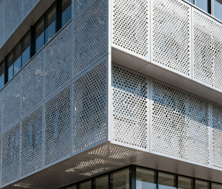 Adaptive Perforated Sun Shading and Ventilation Facades for Hot Climate Architecture