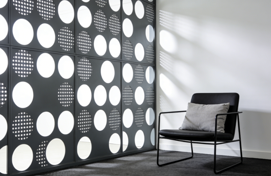 Minimalist Circle Punch Metal Panels for Open Environments