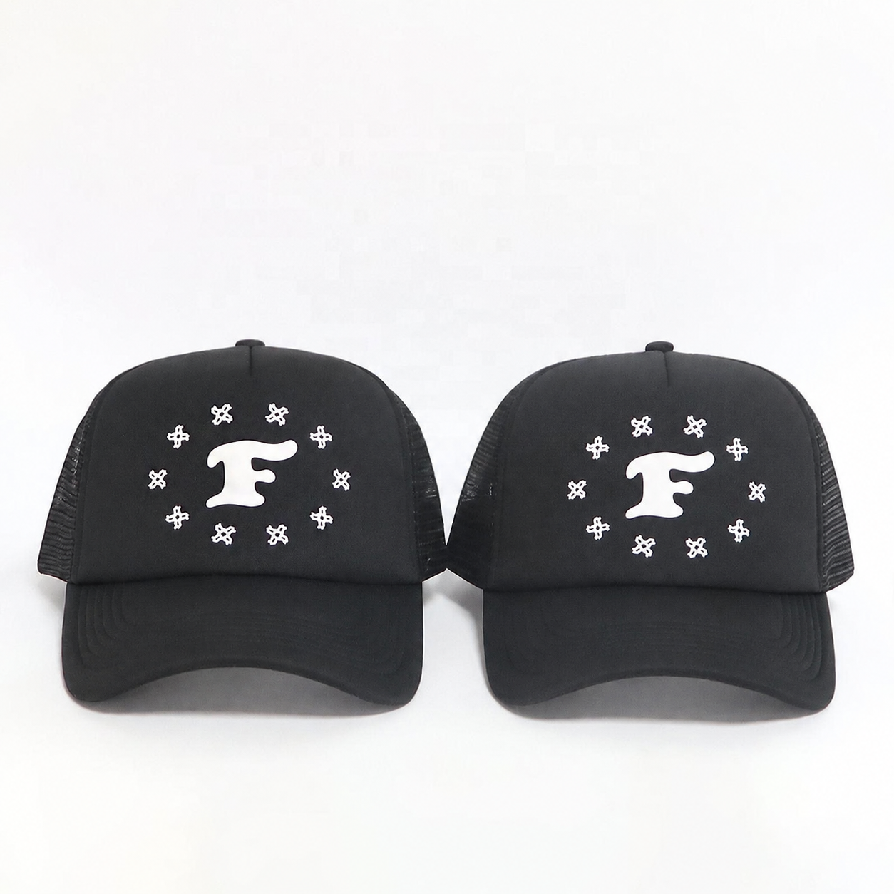 Black Mesh-Back Trucker Cap with White Raised Monogram Graphic