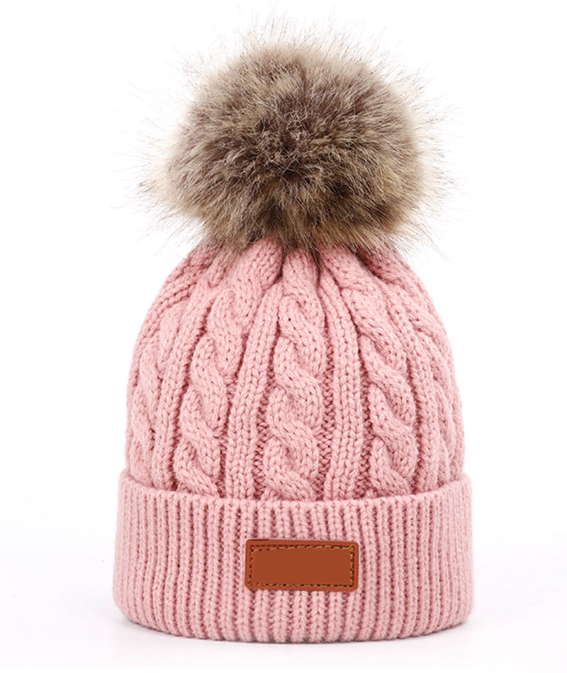 Women's Chunky Cable Knit Beanie Hat with Faux Fur Pom Pom and Leather Patch