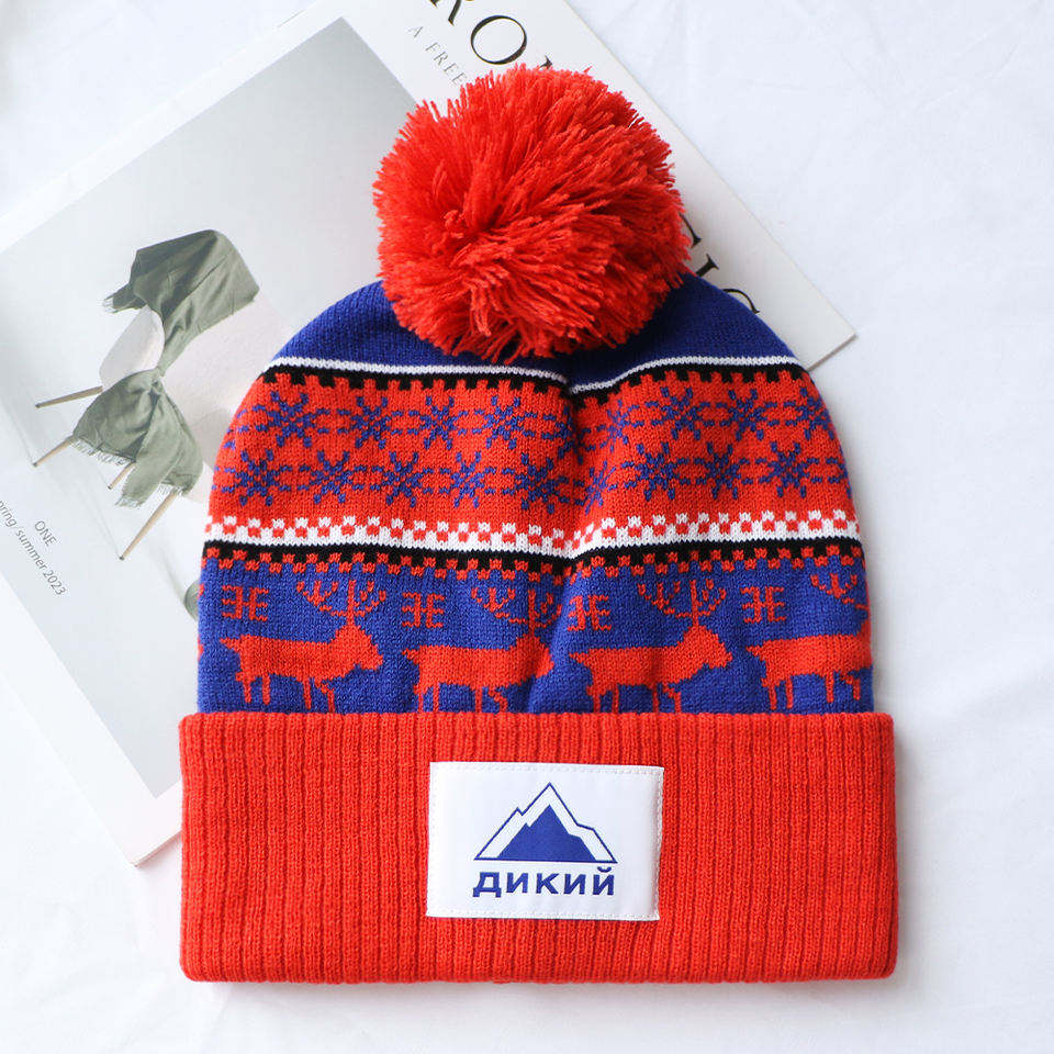 Red and Navy Nordic Reindeer Pom-Pom Cuffed Knit Beanie