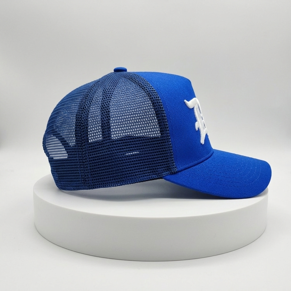 Royal Blue Mesh-Back Trucker Cap with Raised White Gothic DB Embroidery