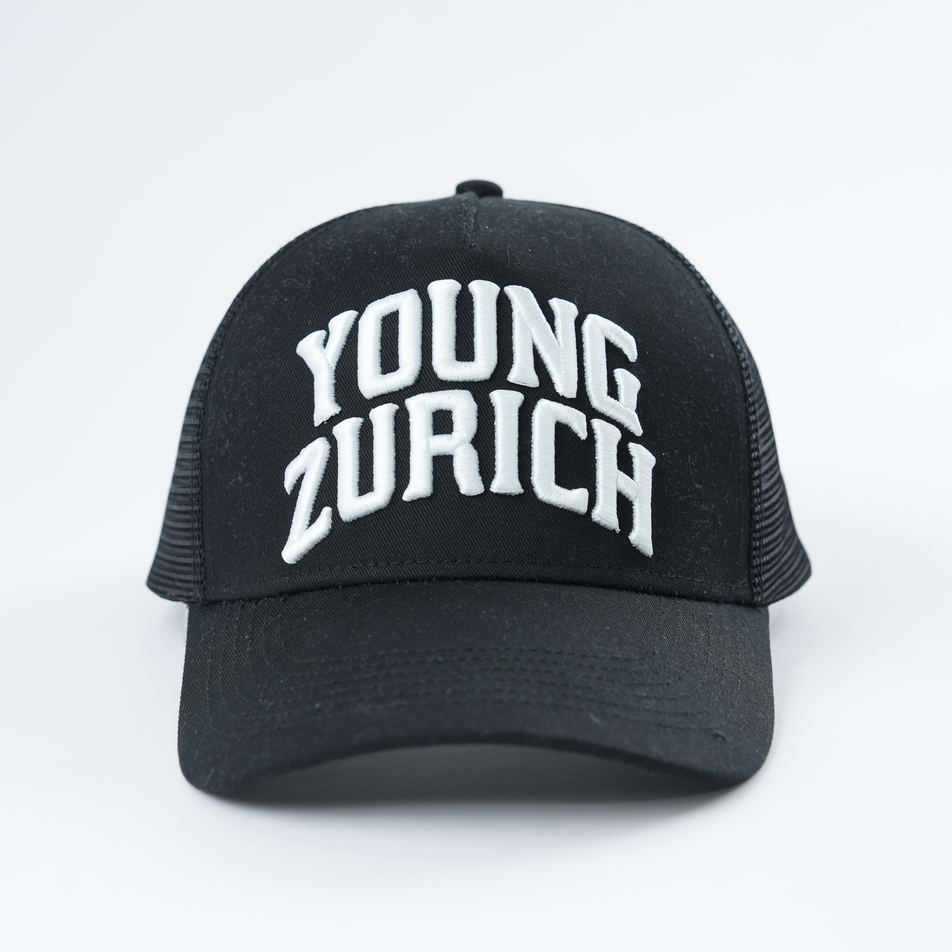 Black Mesh Trucker Hat with Young Zurich Embroidered Slogan Logo