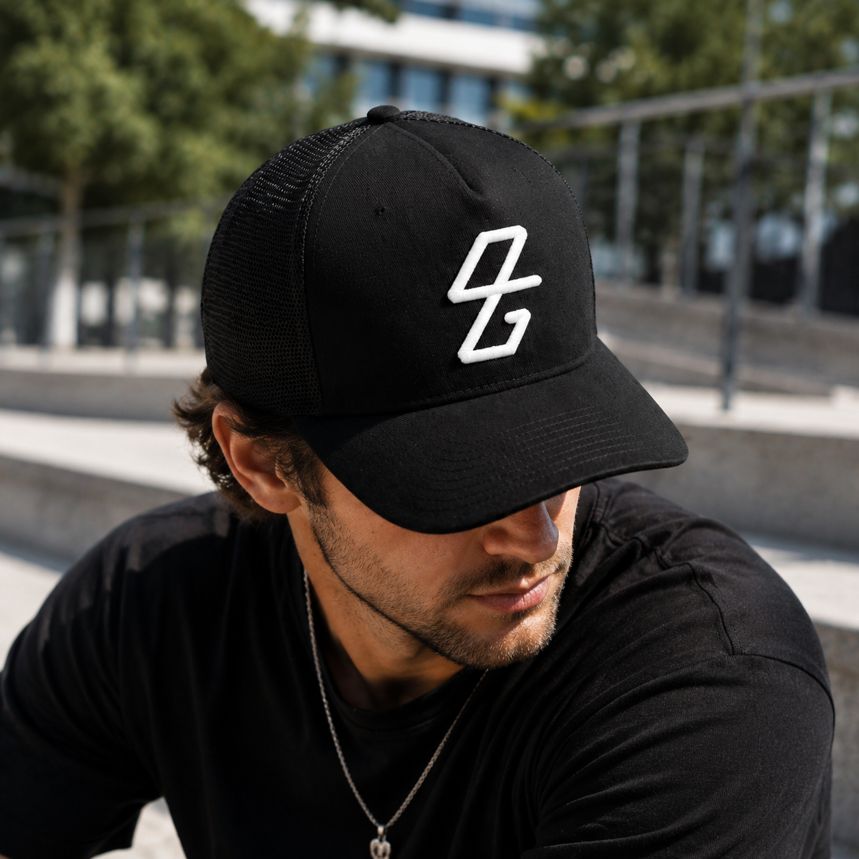 Black Mesh Trucker Cap with White Raised Logo Embroidery