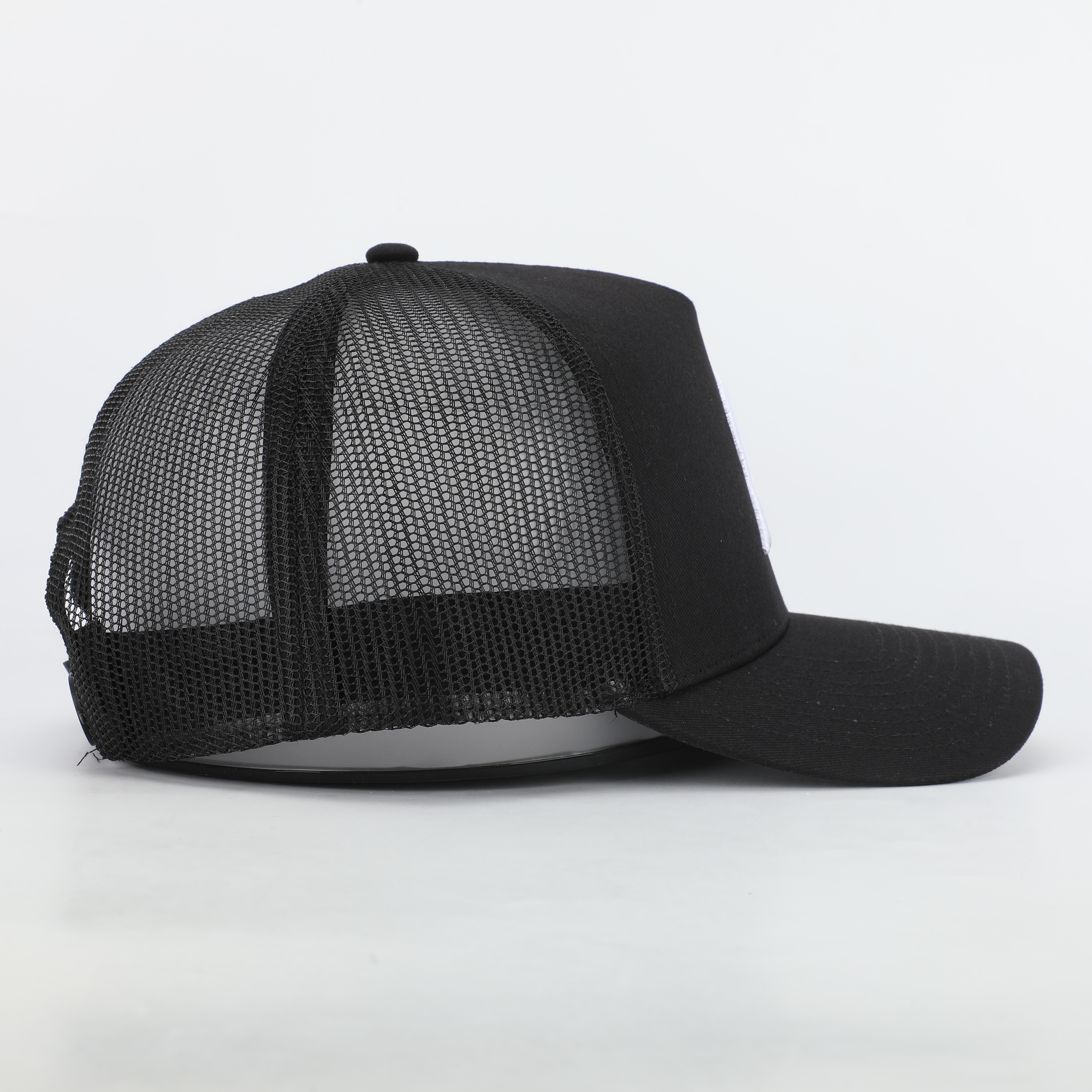 Black Mesh Trucker Hat with White Embroidered A Logo