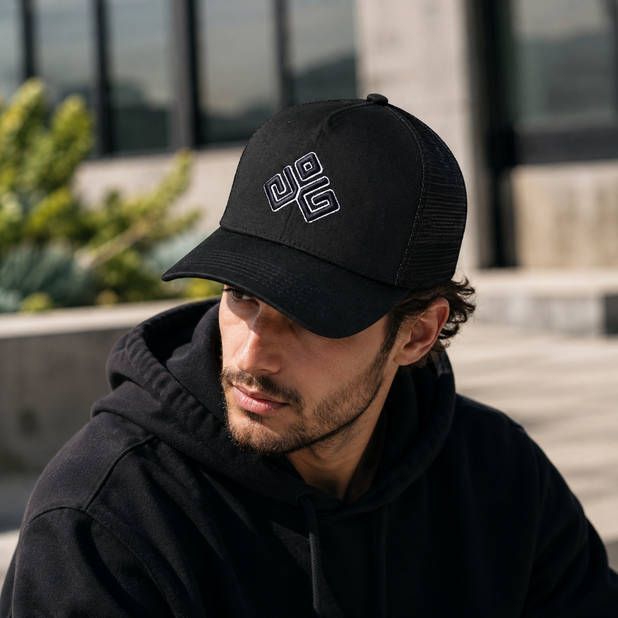 Black Cotton Mesh Trucker Cap with White Embroidered Geometric Logo