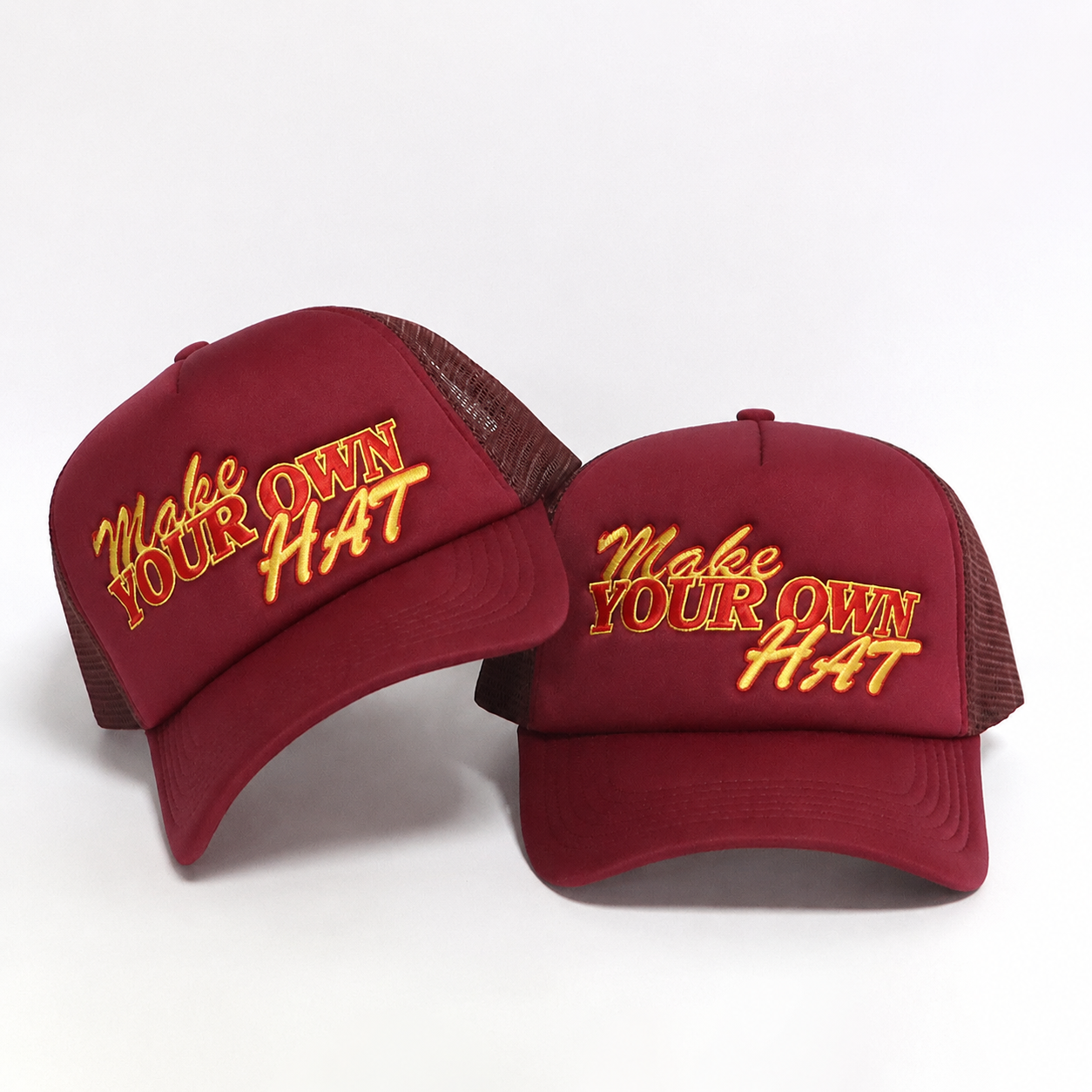 Burgundy Mesh-Back Trucker Cap with Raised Make Your Own Luck Embroidery