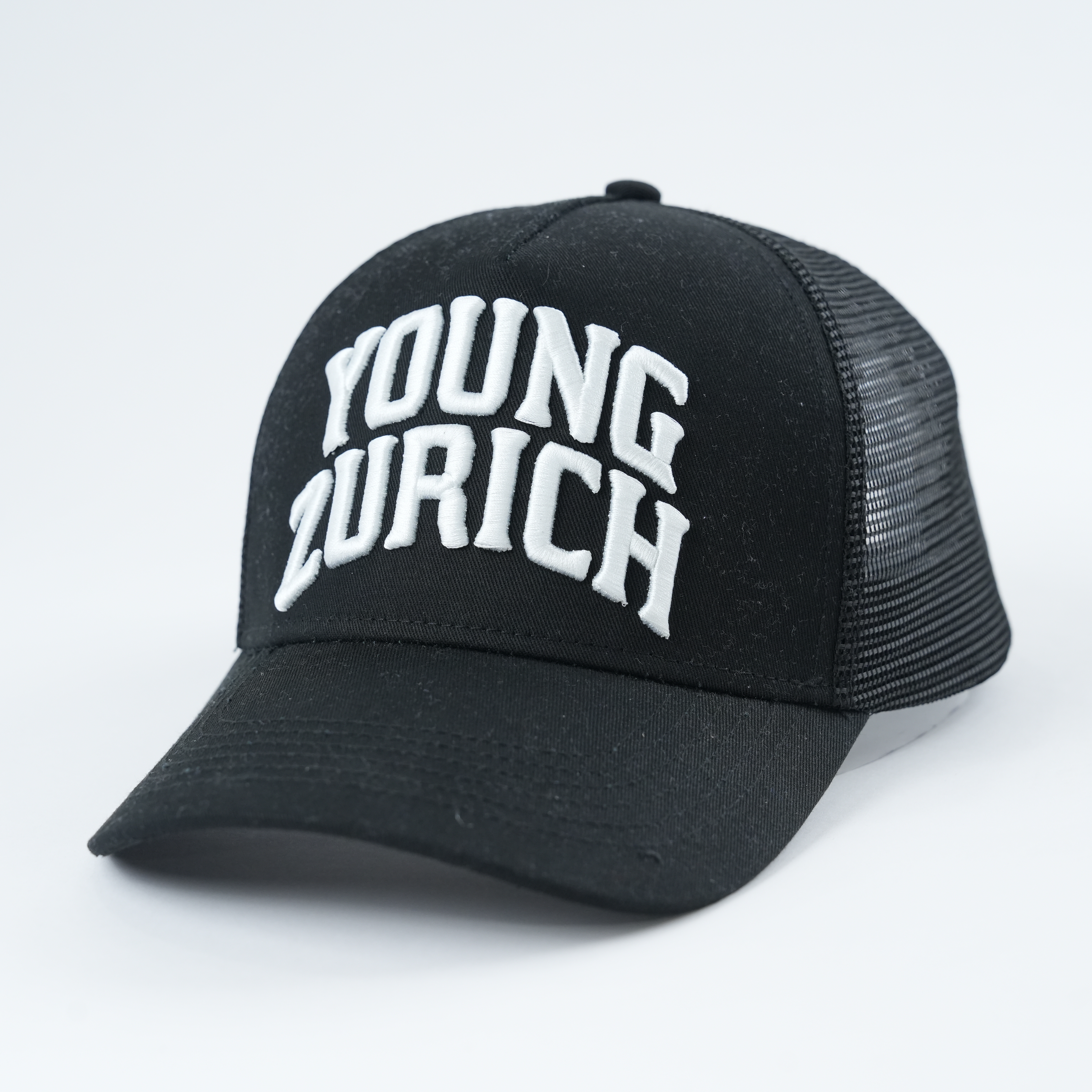 Black Mesh Trucker Hat with Young Zurich Embroidered Slogan Logo