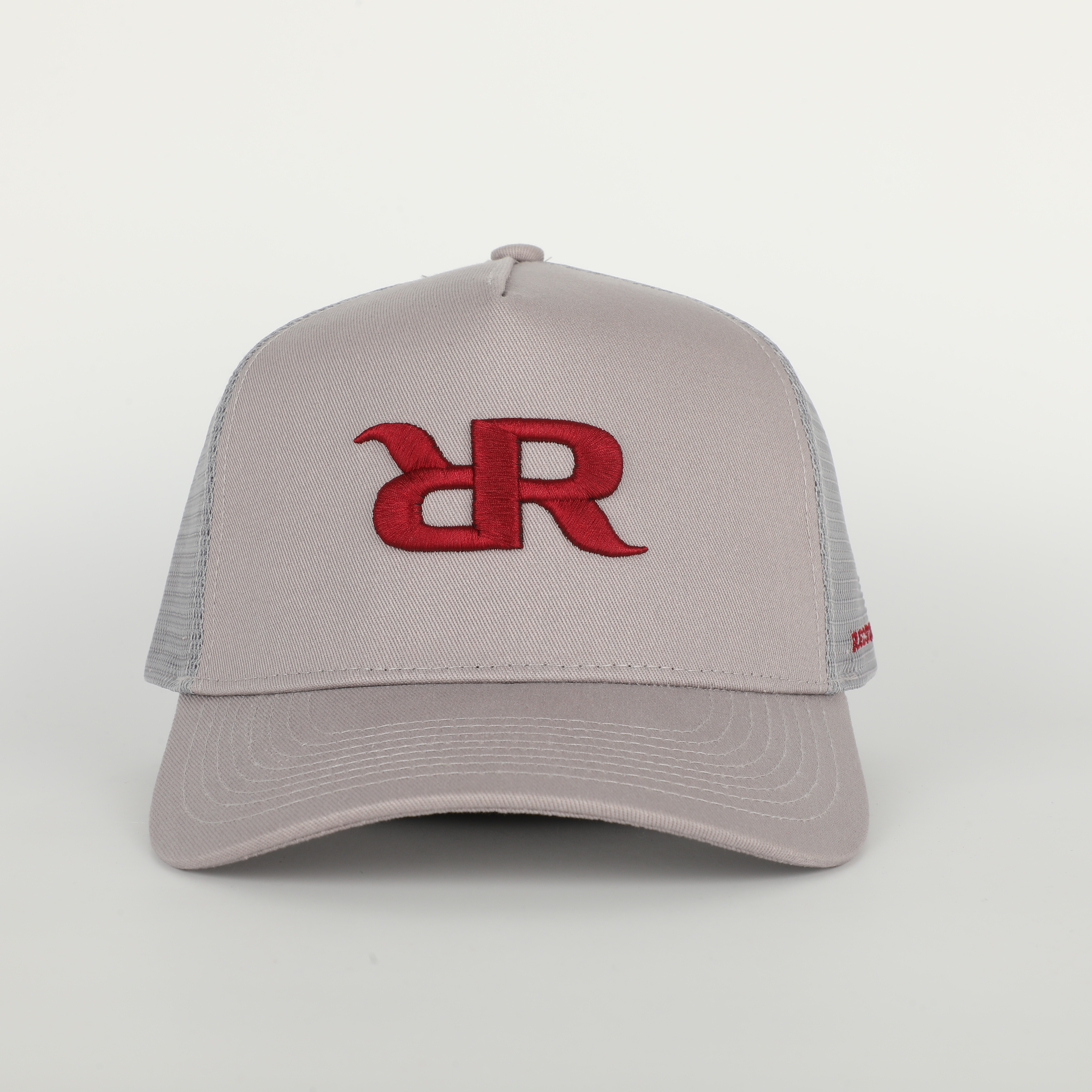 Stone Gray Cotton Trucker Hat with Red Embroidered Monogram Logo