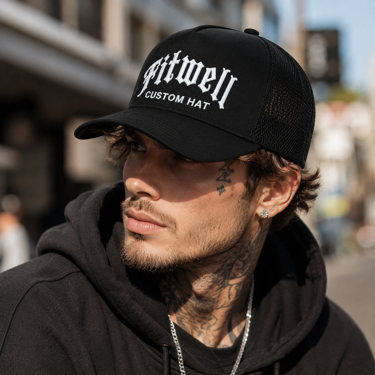 Black Mesh Trucker Hat with White Strength Embroidery