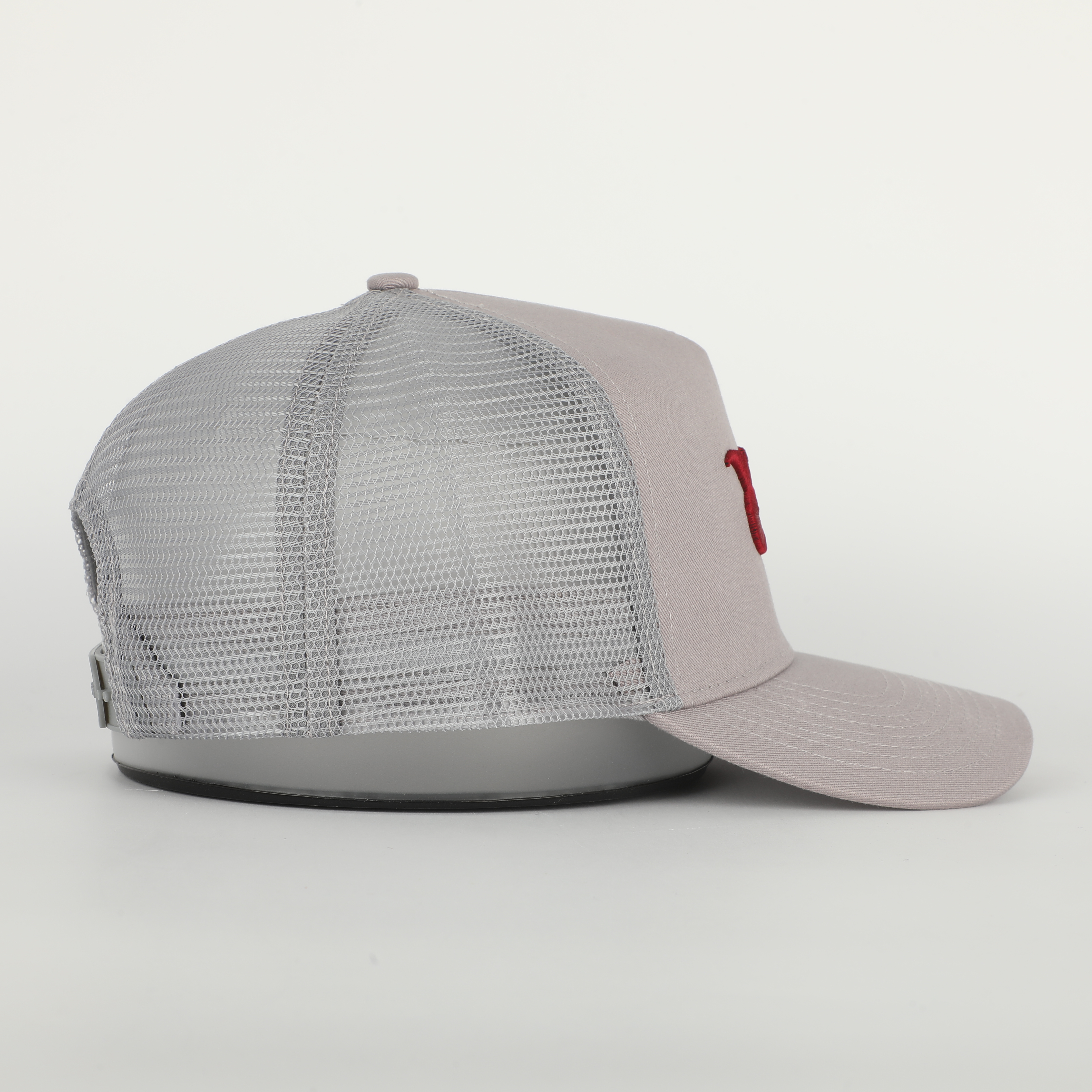 Stone Gray Cotton Trucker Hat with Red Embroidered Monogram Logo