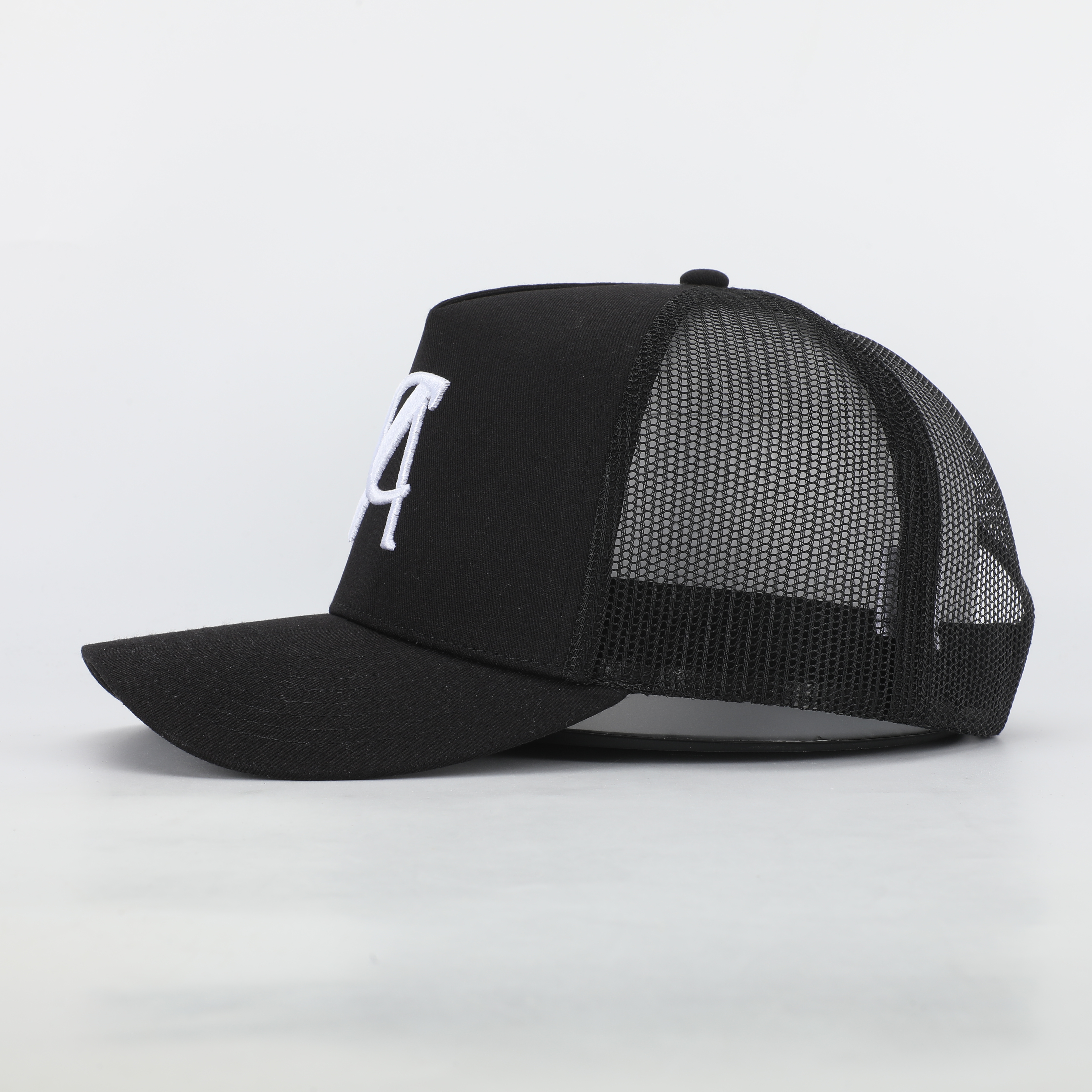 Black Mesh Trucker Hat with White Embroidered A Logo