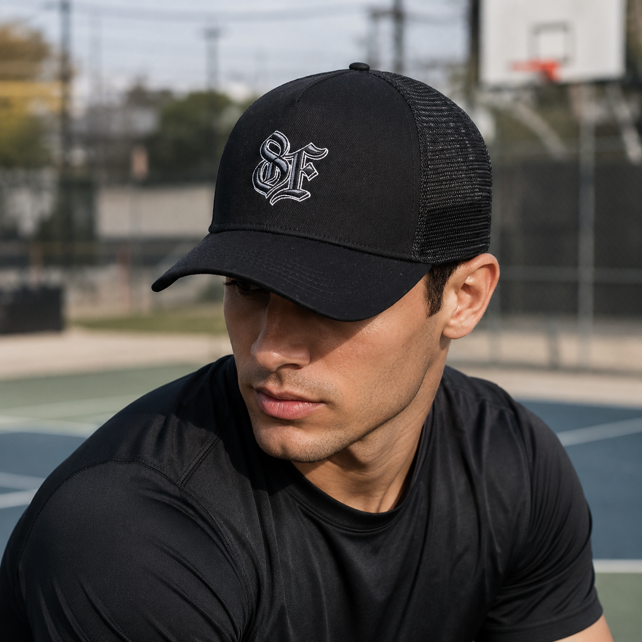 Black Mesh Trucker Cap with Embroidered Gothic Letter Logo