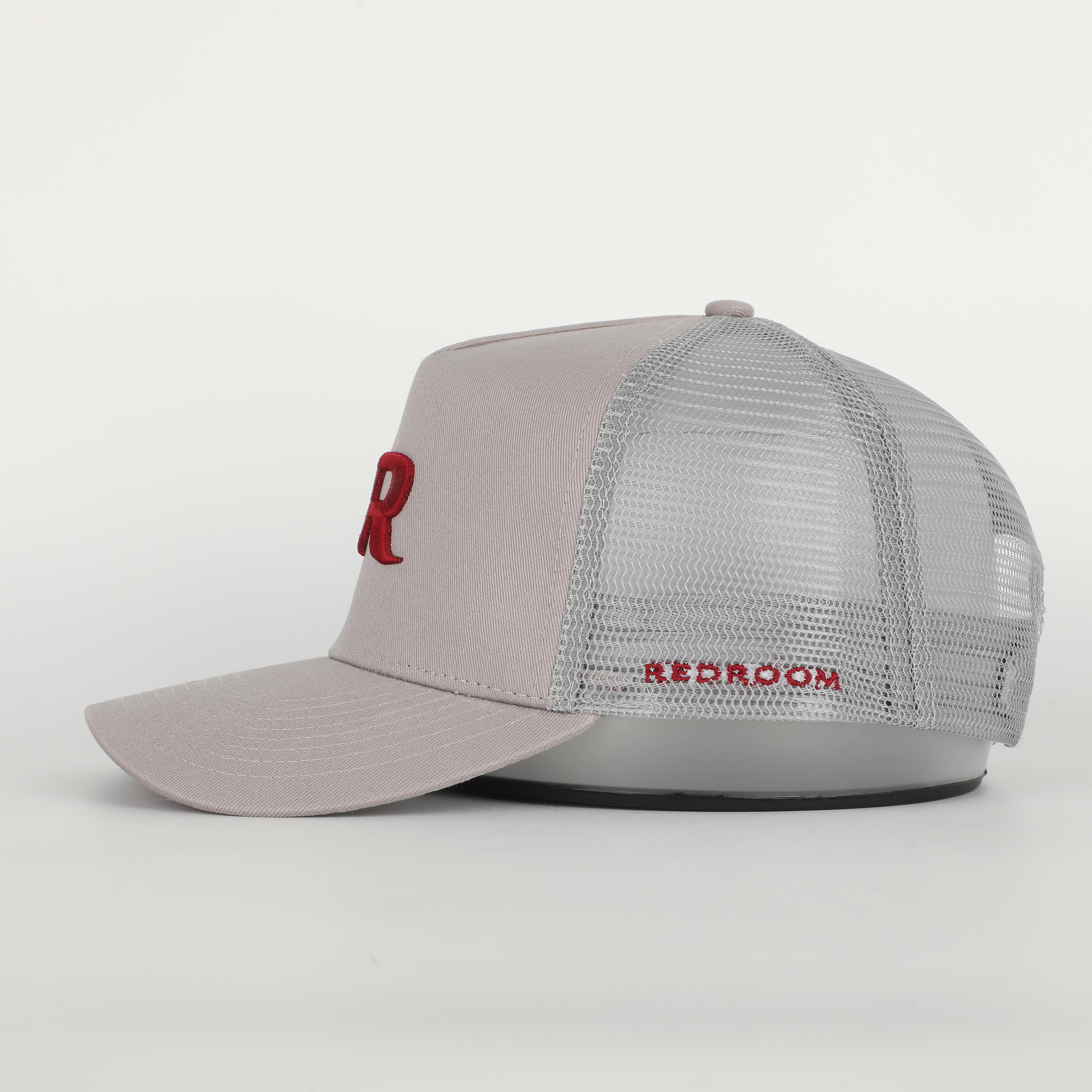Stone Gray Cotton Trucker Hat with Red Embroidered Monogram Logo