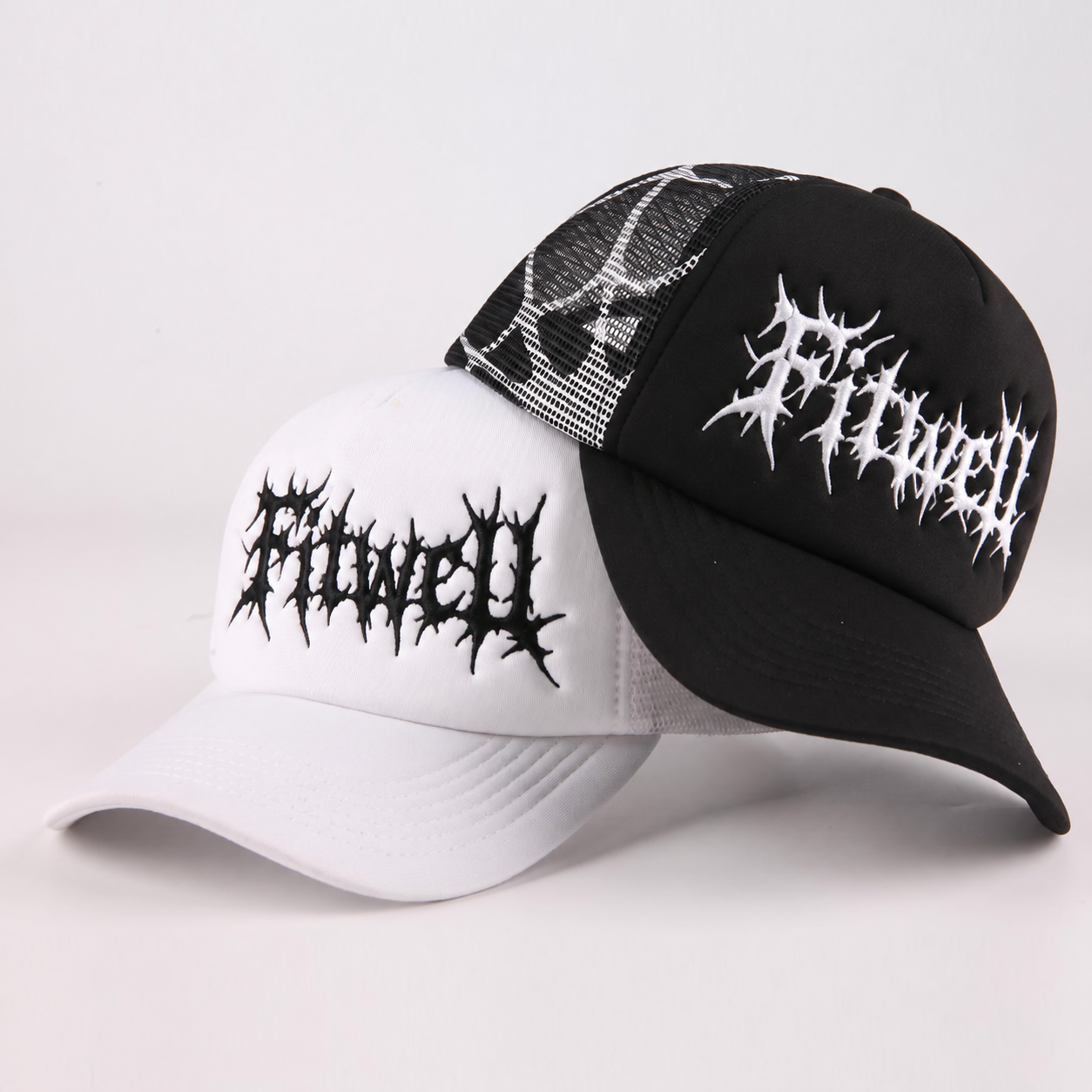 Black and White Foam Trucker Hat with Gothic Embroidered Logo and Mesh Back Design