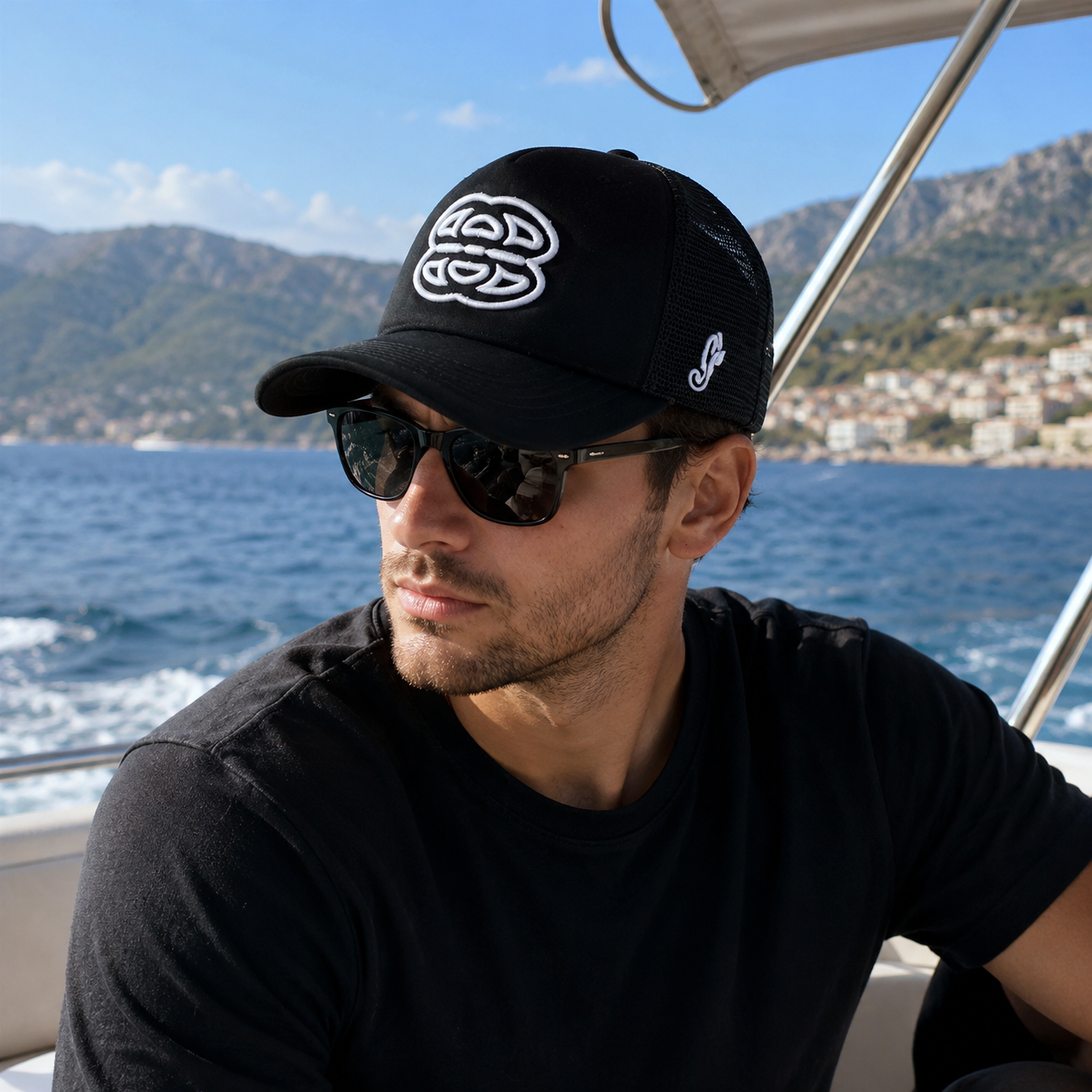 Black Foam Mesh Trucker Cap with White Raised Logo Embroidery