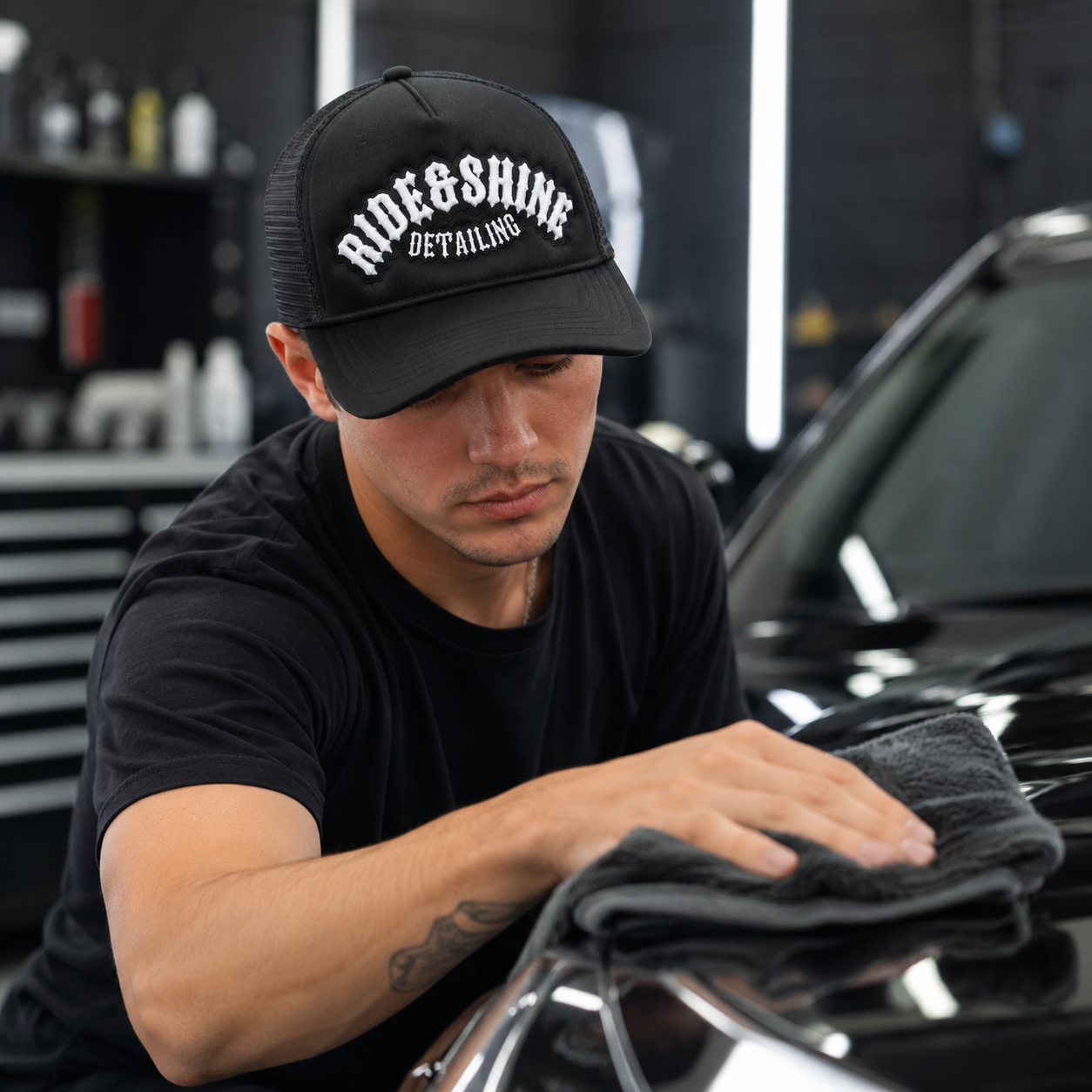 Black Foam Trucker Cap with Raised Embroidered Front Logo