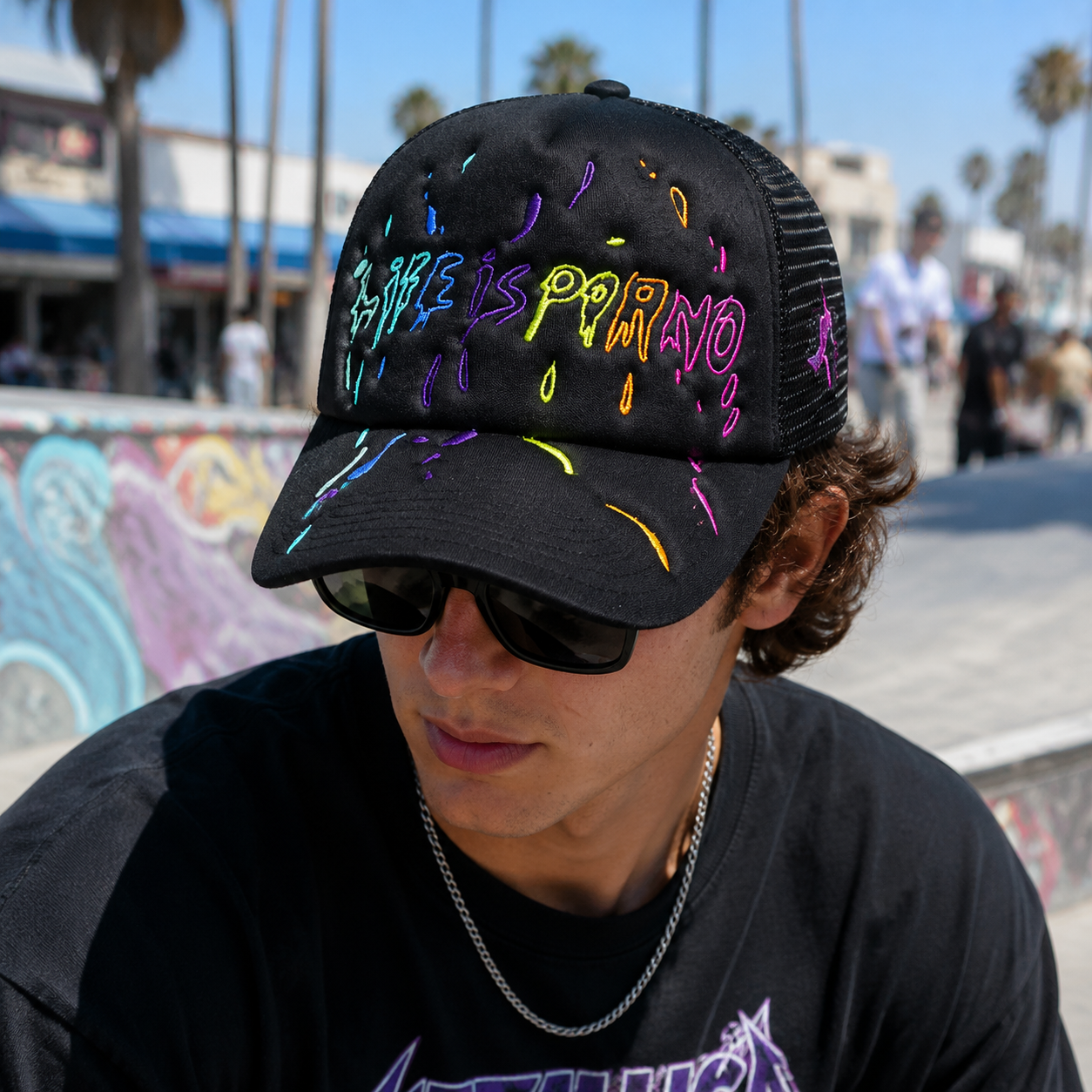 Black 5 Panel Foam Trucker Hat with Colorful Flat Embroidery Graphic Design