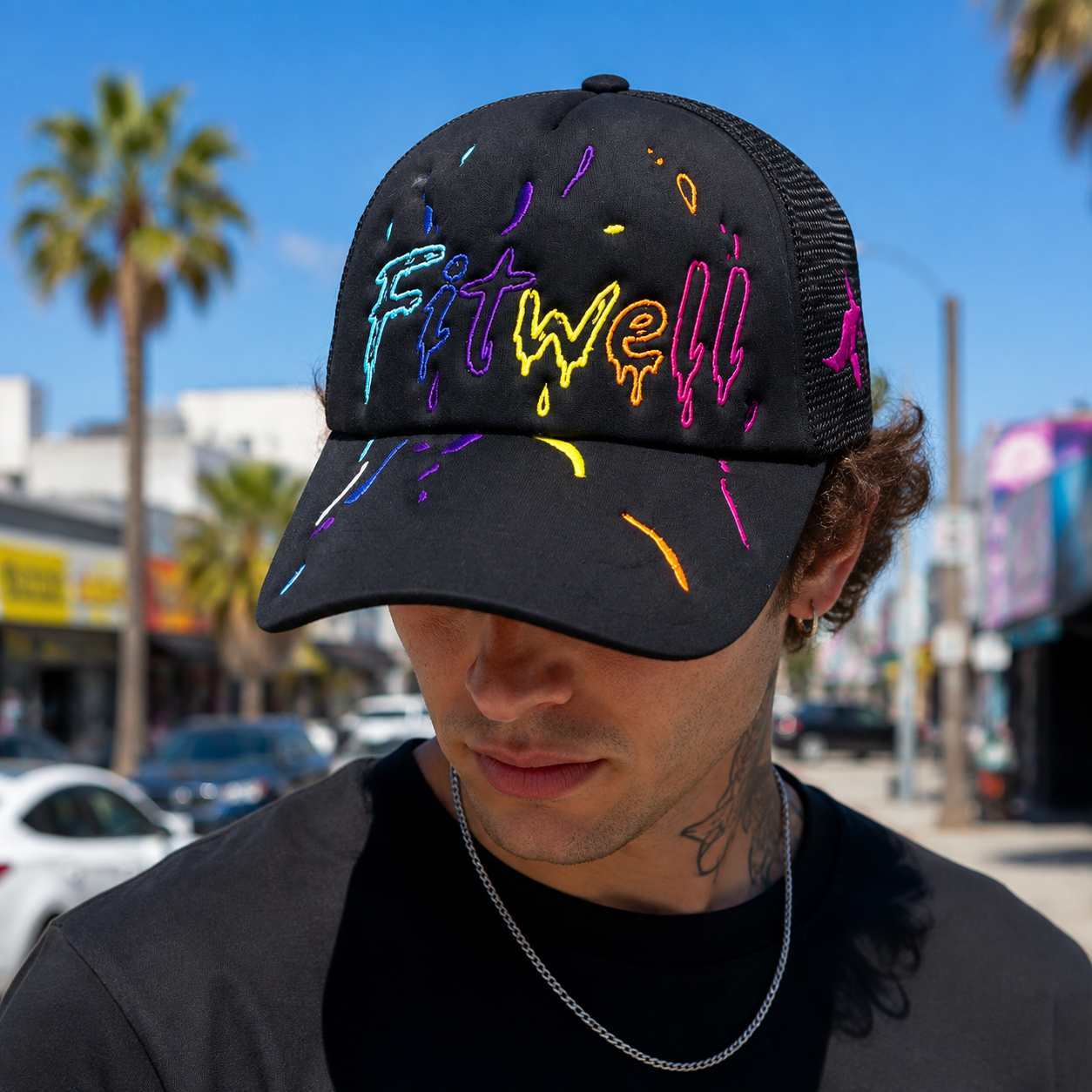 Black 5 Panel Foam Trucker Hat with Colorful Flat Embroidery Graphic Design
