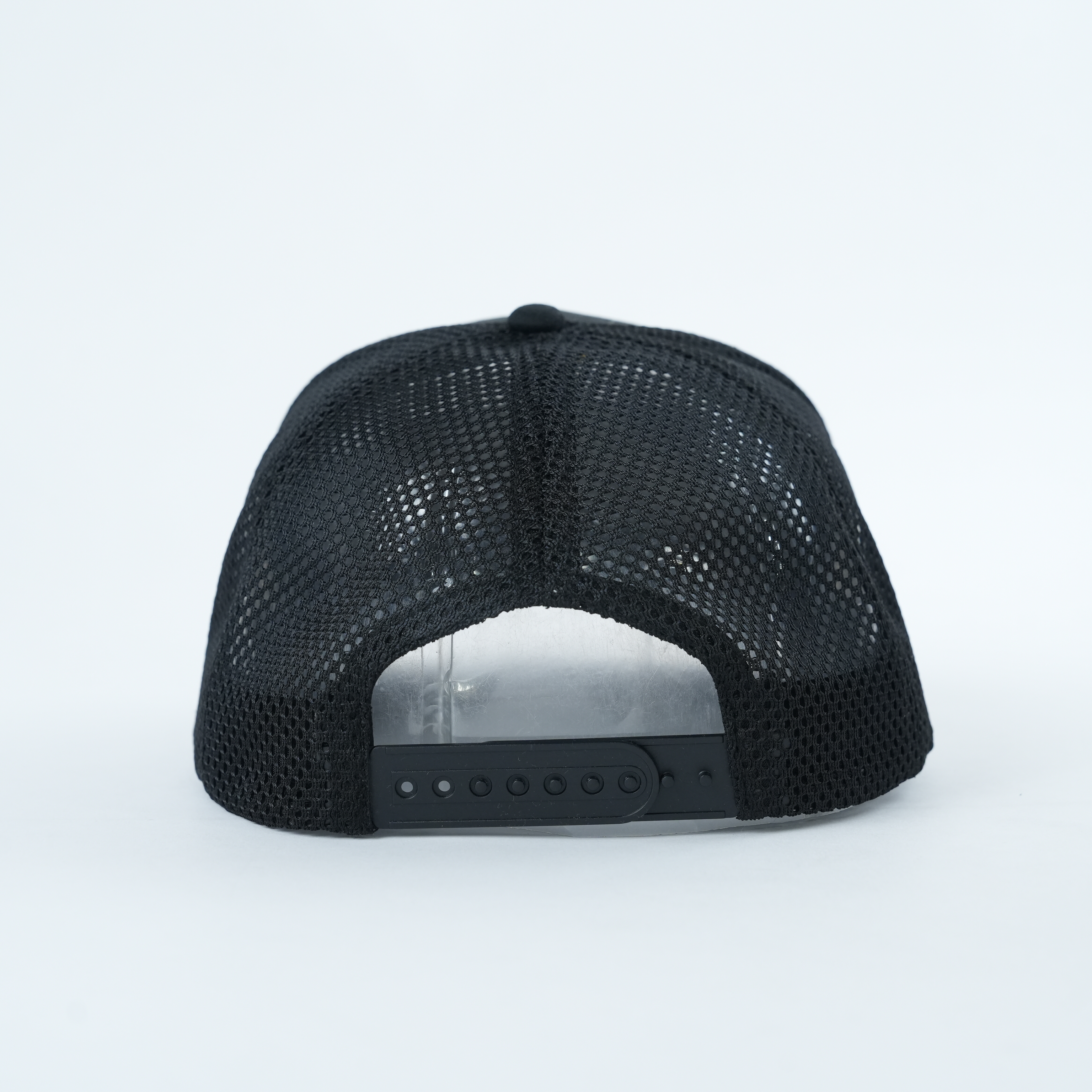 Black Mesh Trucker Hat with White Strength Embroidery