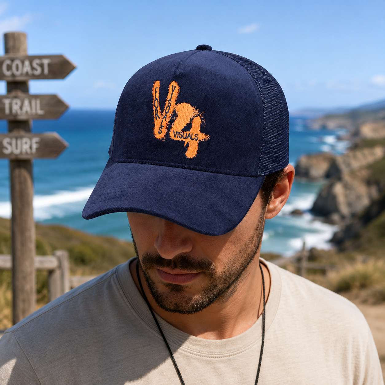 Navy Suede Mesh Trucker Cap with Orange Embroidered Graphic