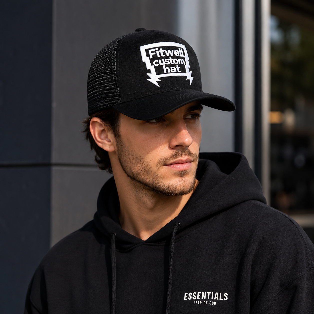 Black Suede Front Mesh Trucker Cap with Bold White Embroidered Graphic