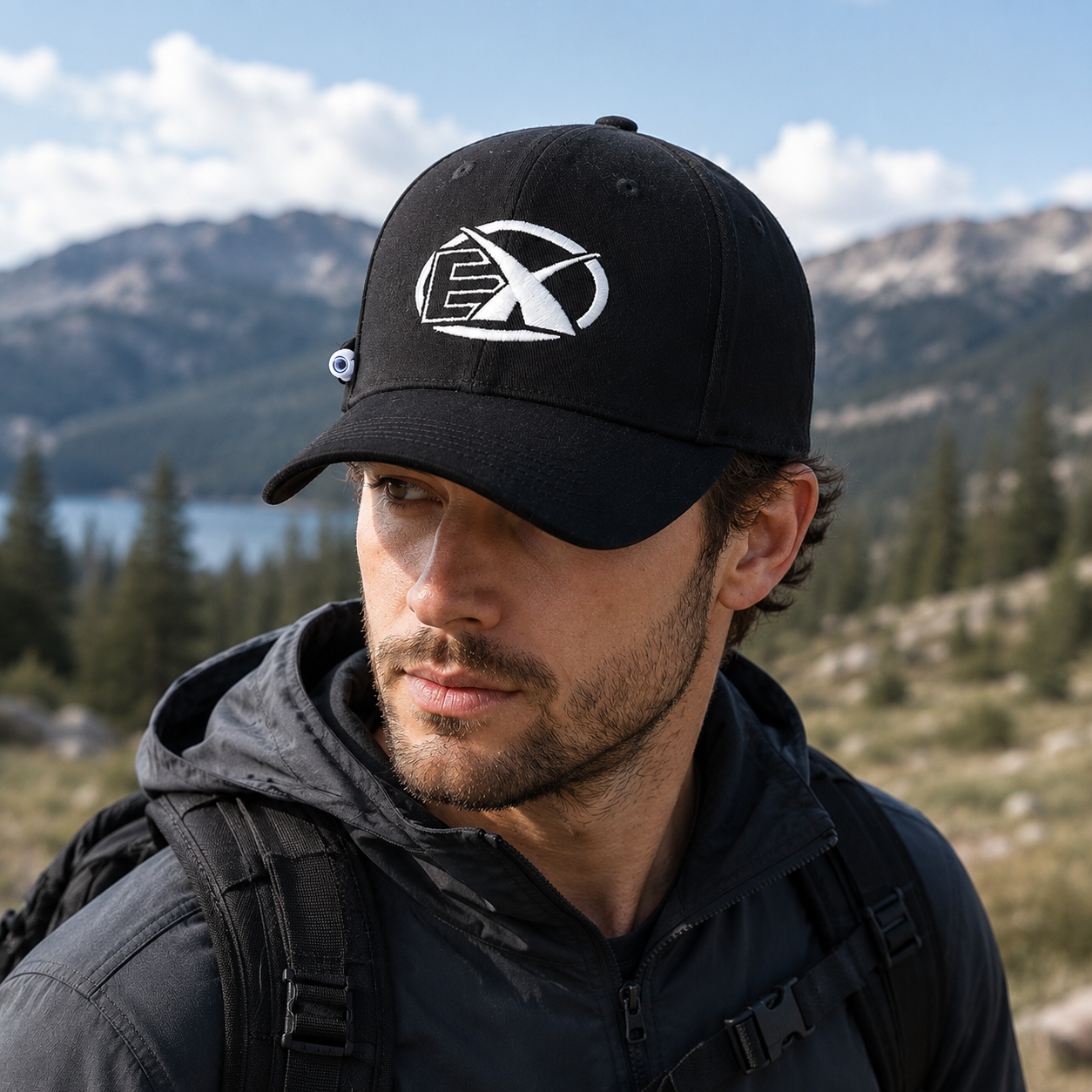 Black Six-Panel Curved Brim Cap with White Geometric Emblem