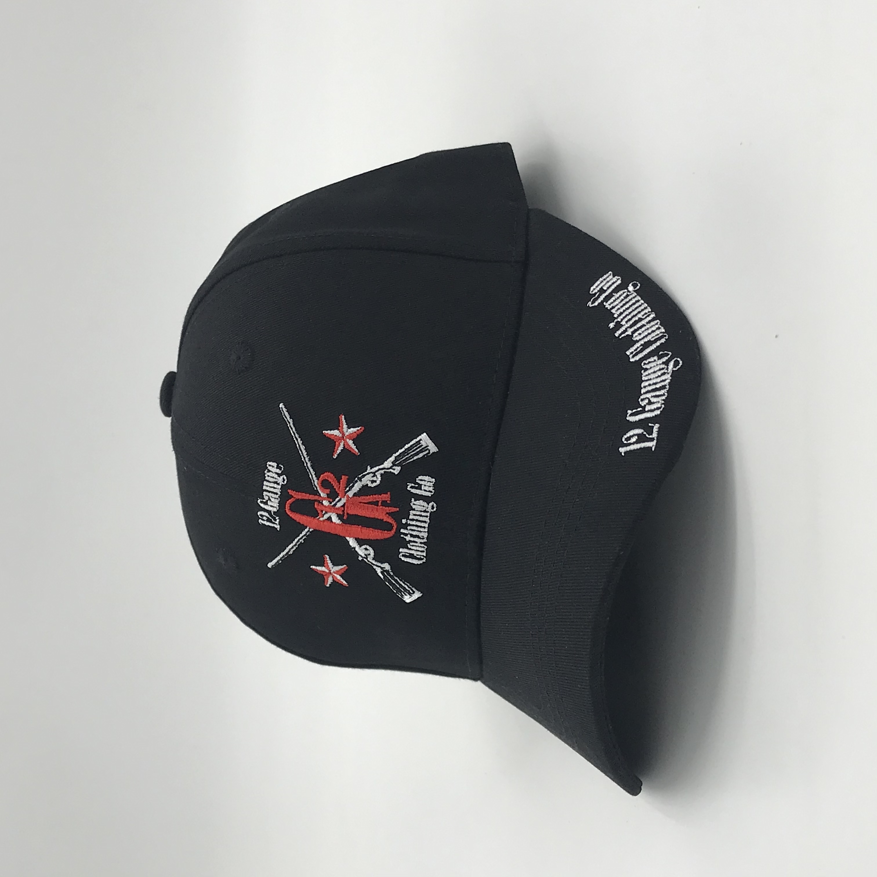 Black Six-Panel Baseball Cap with Red and White Crossed-Rifle Embroidery