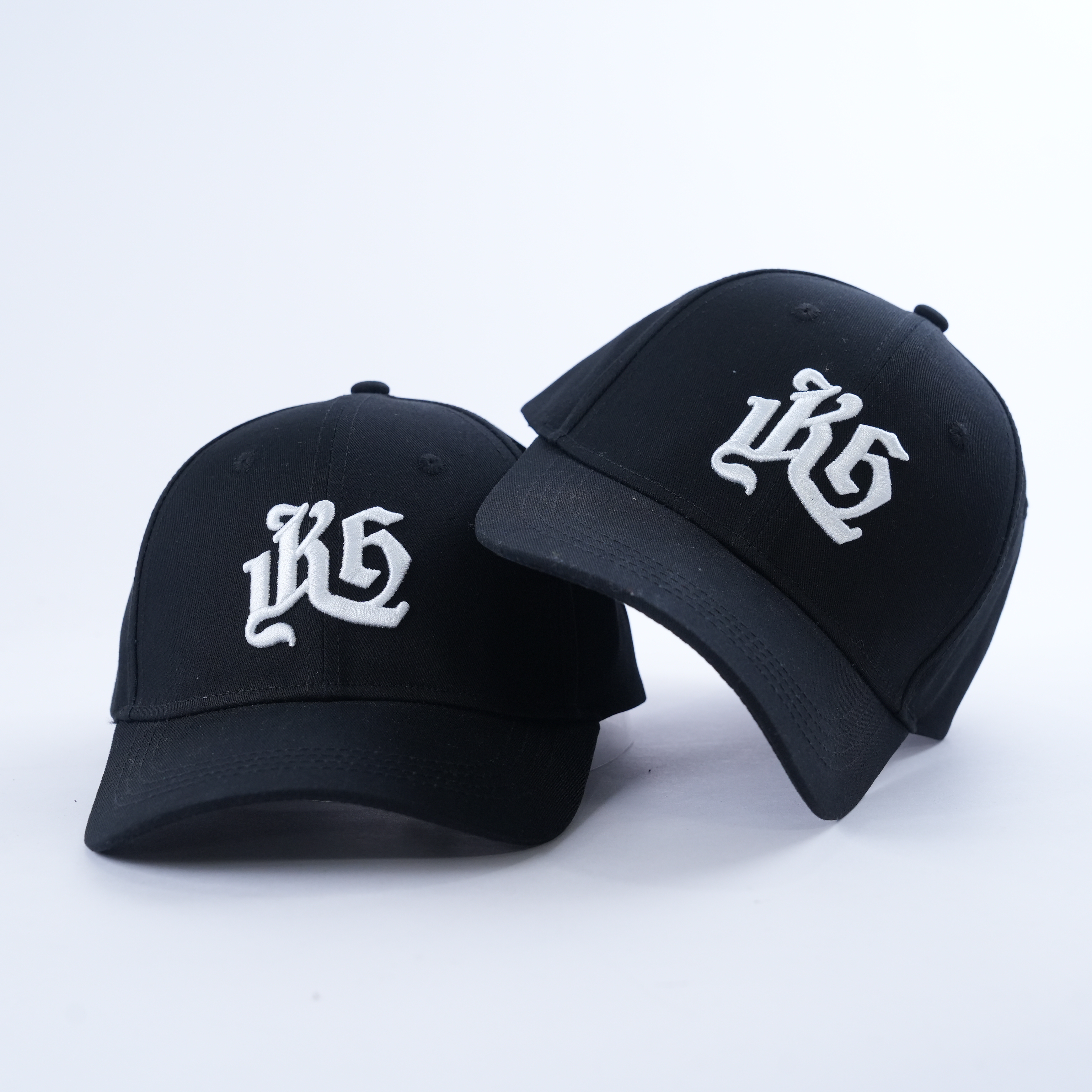 Black Six-Panel Curved Brim Cap with White Gothic Monogram