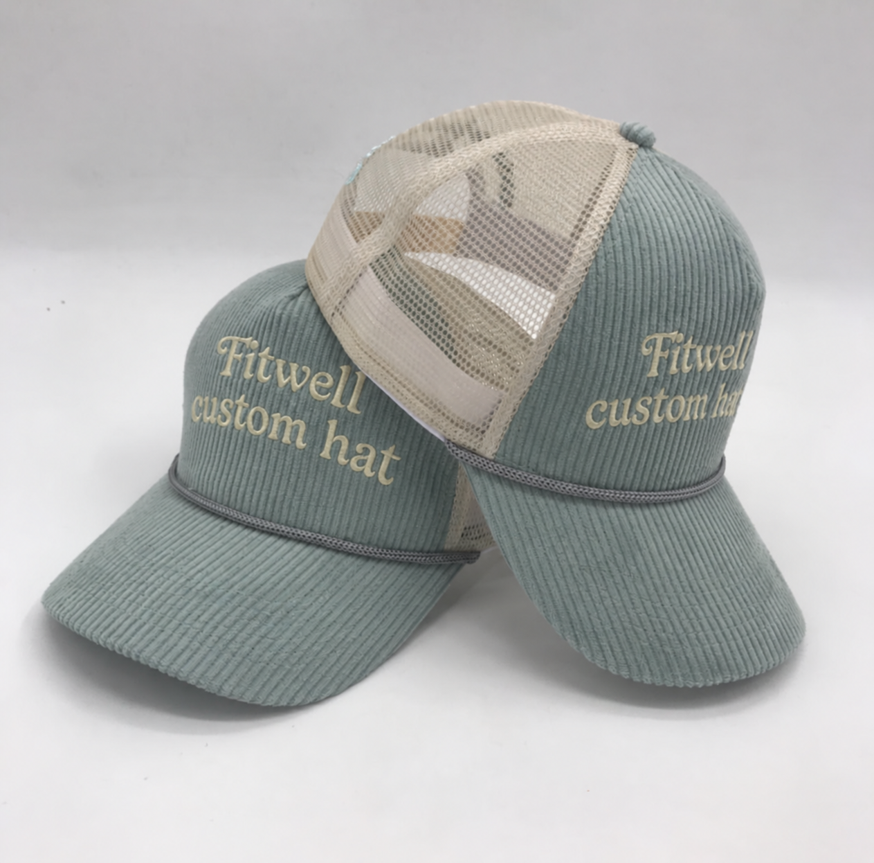 Sage Green Corduroy Trucker Hat with Embroidered Energy & Empower Logo