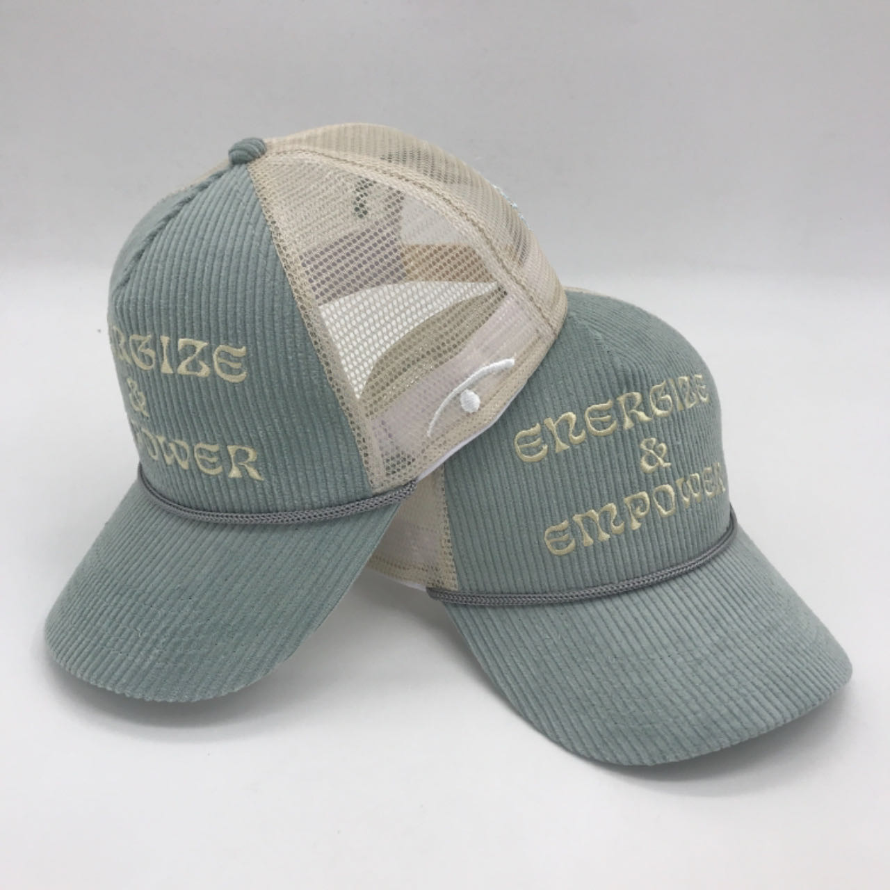 Sage Green Corduroy Trucker Hat with Embroidered Energy & Empower Logo