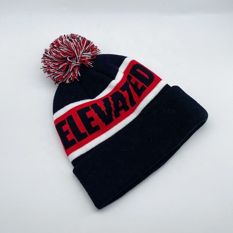 Elevated Jacquard Pom Pom Winter Beanie Hat with Cuffed Design
