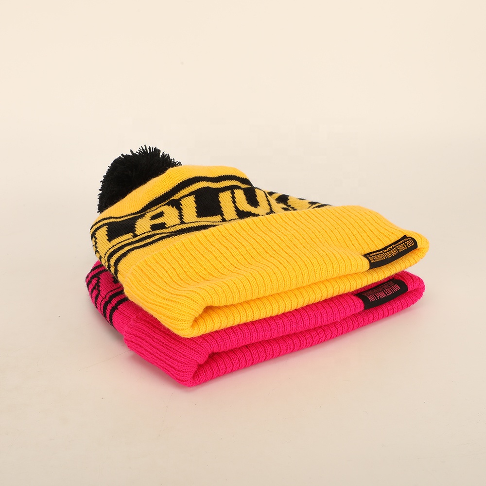 Winter Pom Pom Knitted Beanie Hat with Bold Letter Jacquard Cuffed Design