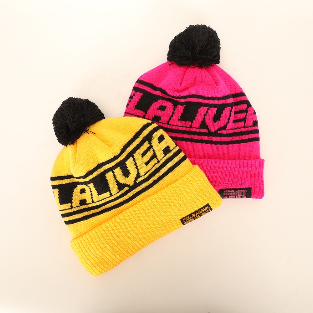Winter Pom Pom Knitted Beanie Hat with Bold Letter Jacquard Cuffed Design