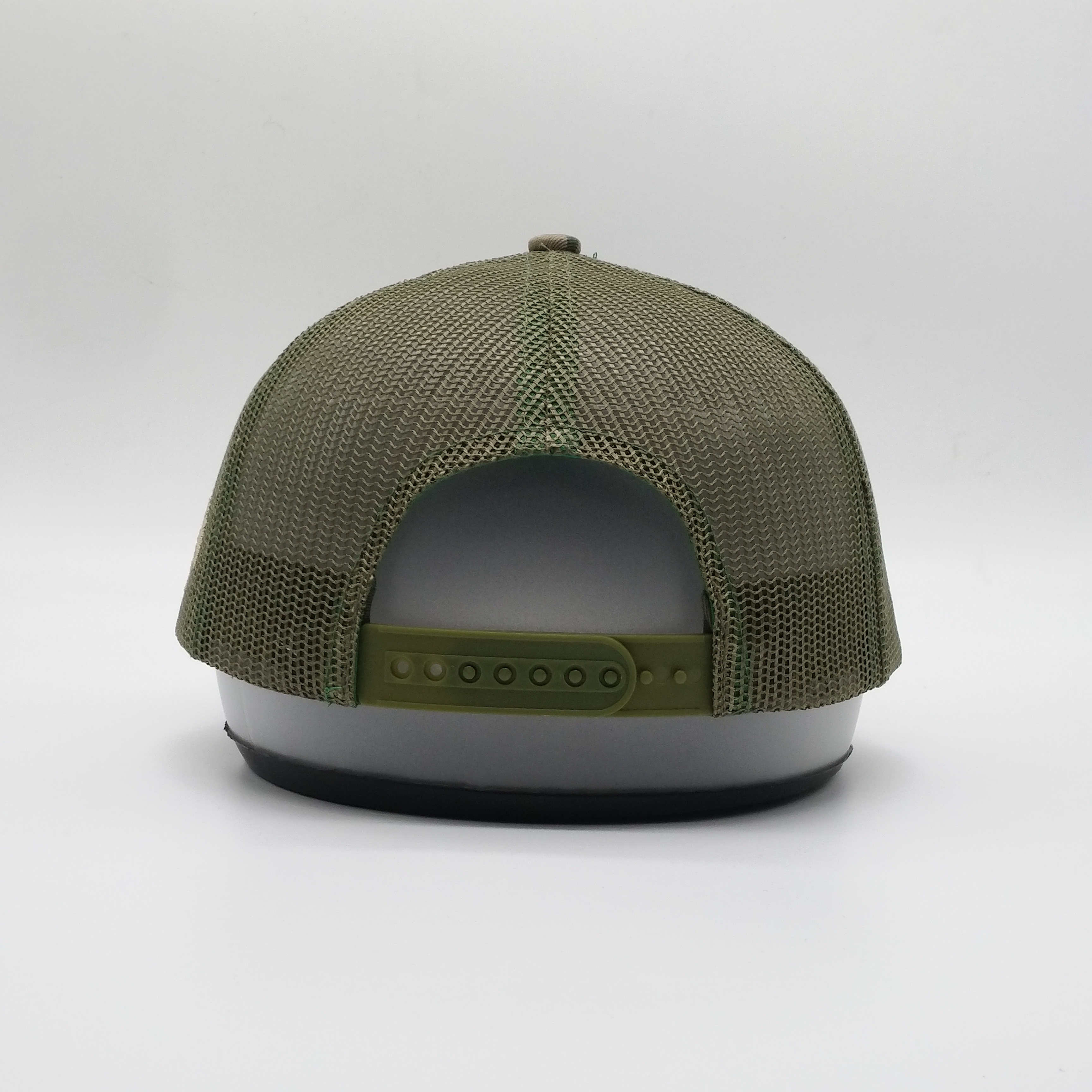 Camouflage Mesh Trucker Hat with Oval Leather Patch - Sling’n Stitches Logo Cap