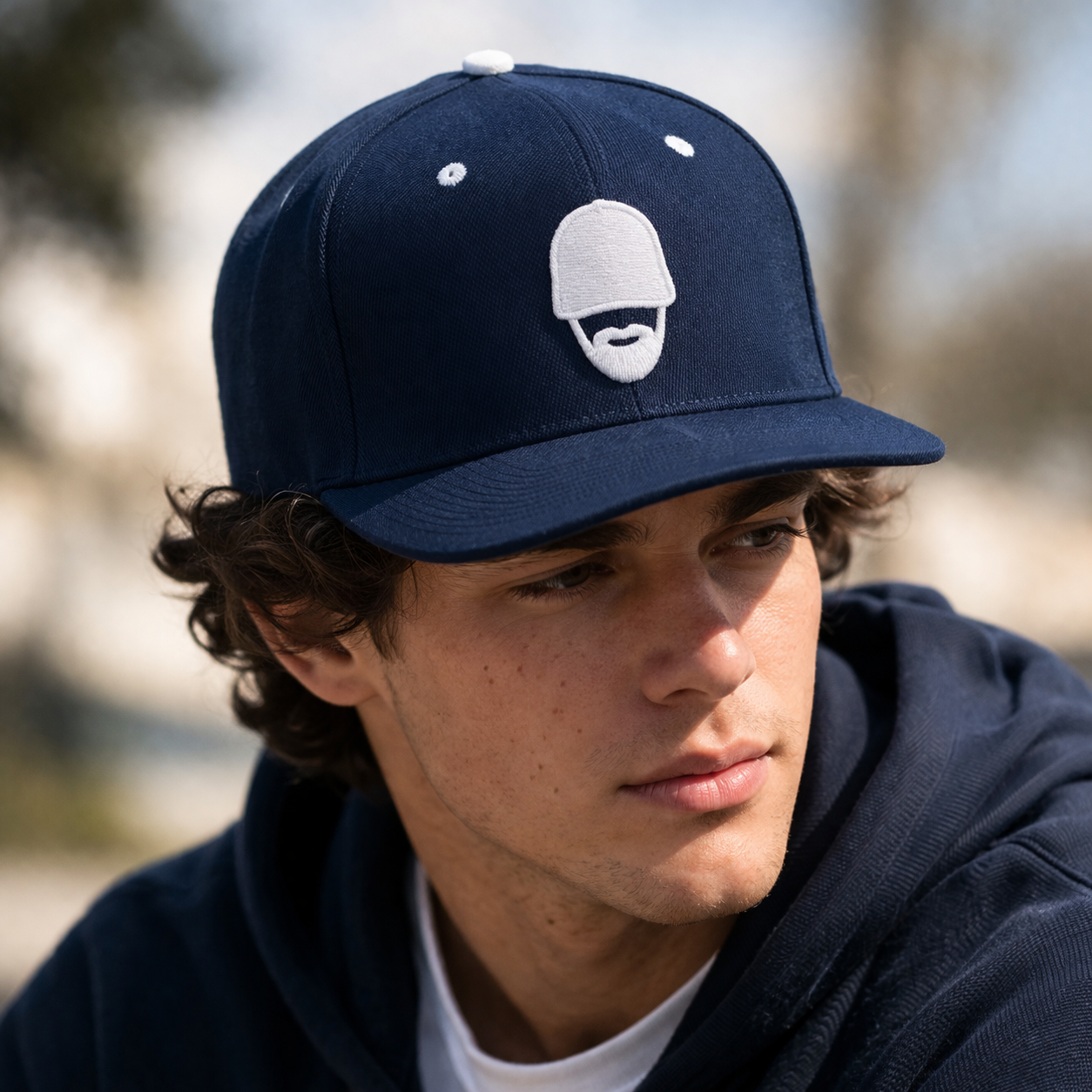 Navy Blue Flat Brim Snapback Cap with Minimalist Face Embroidery