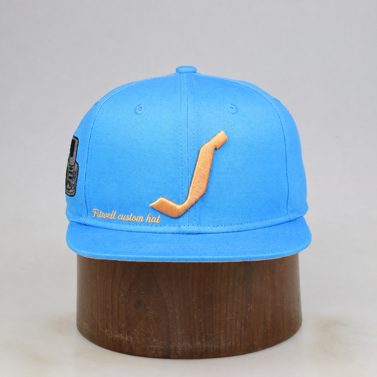 Sky Blue Flat-Brim Six-Panel Snapback with Gold Curved-Logo Embroidery